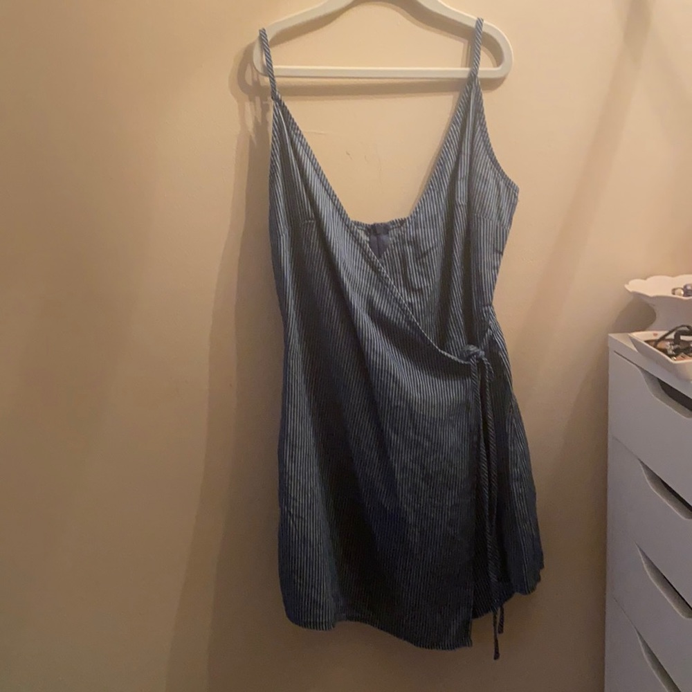Blāshe Navy blue with white stripes romper, never worn, great condition.